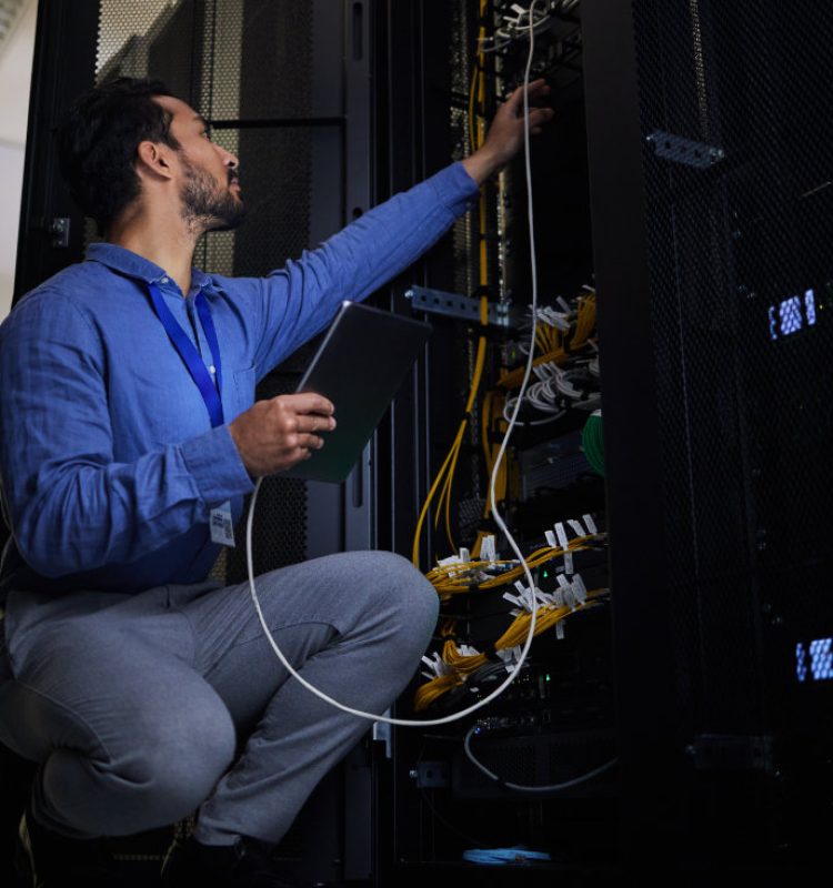 Tablet, server room and engineer with connection cable for maintenance or software update at night